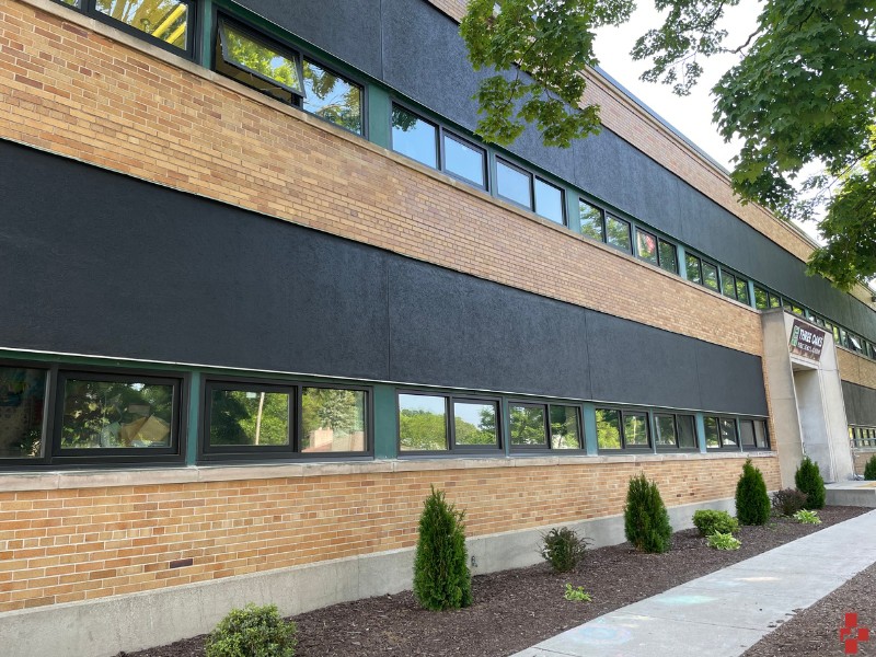 Black concrete and brick wall - Architectural speciality coatings in Muskegon, MI