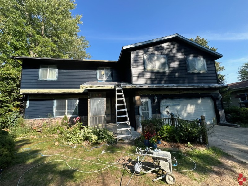 Two-storey house, dark blue - provided with D4's residential painting services