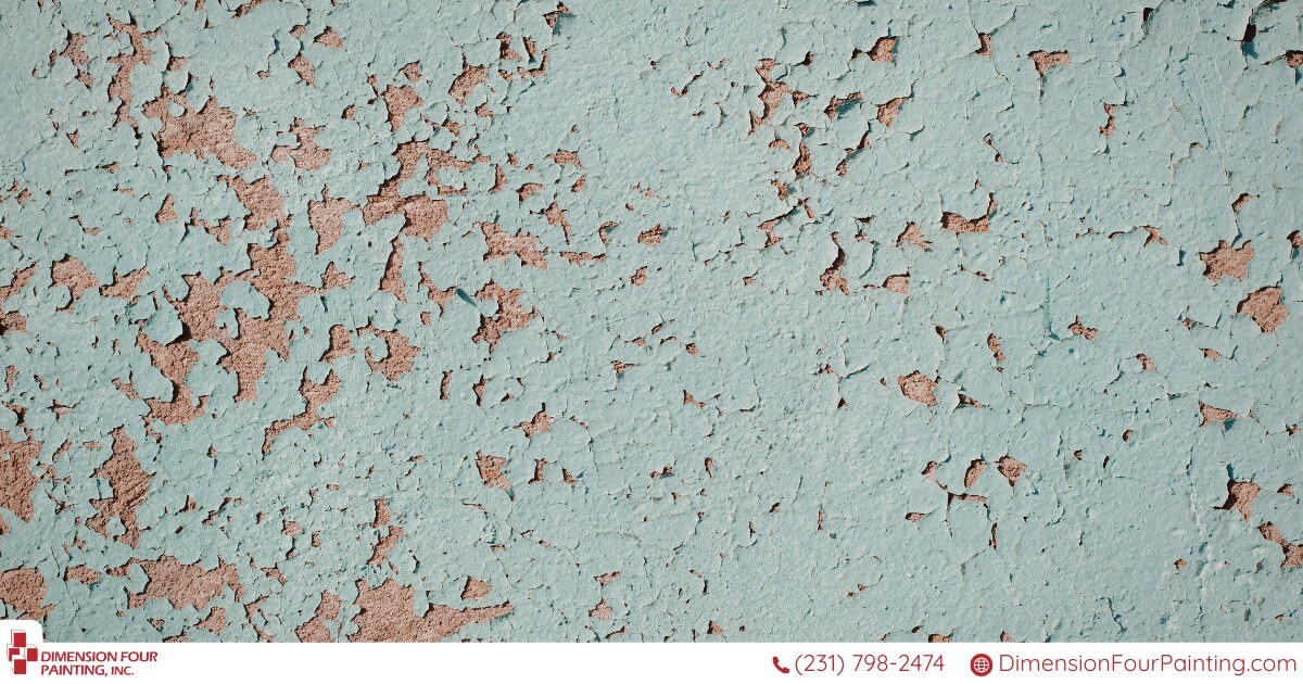 Peeling blue paint on wall