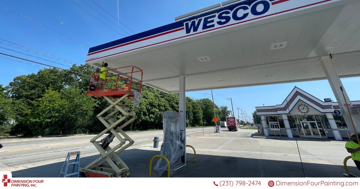 Commercial painter working on new gasoline station