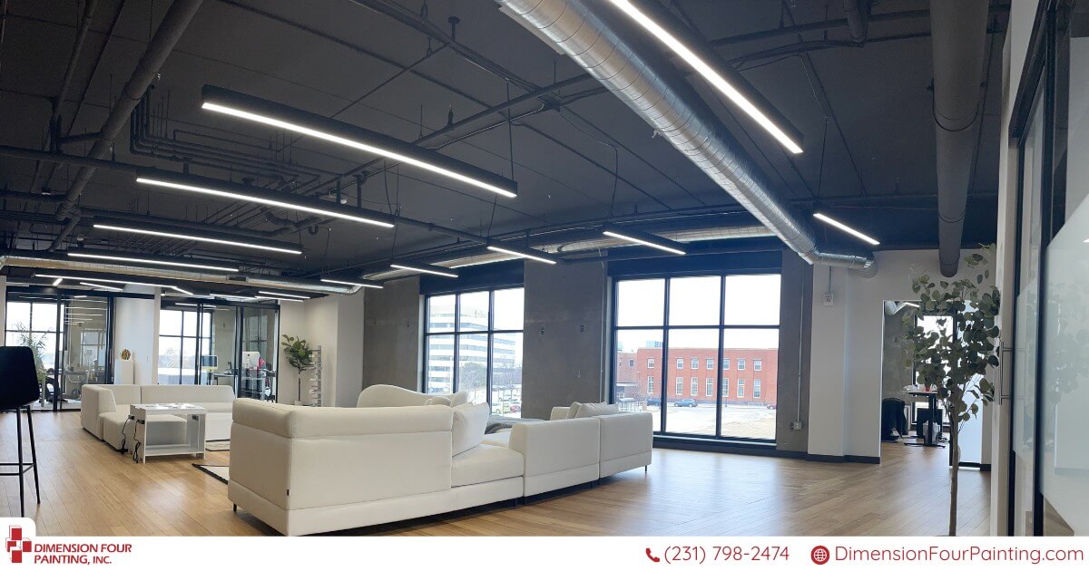 Office with white sofa and freshly painted walls and ceilings - interior painting